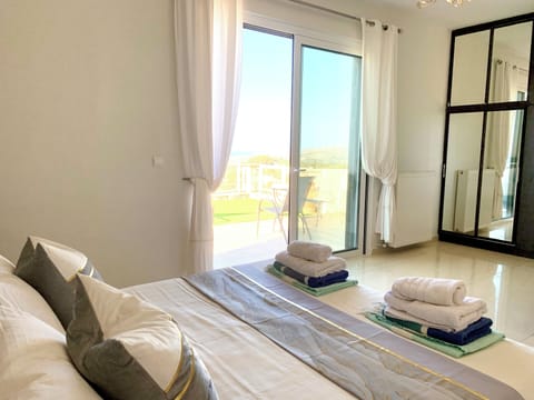 A bedroom with beautiful sea view