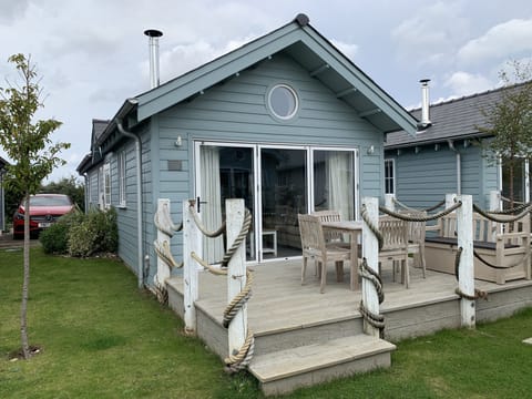 We offer an electric charge point, attached to the beach house for our guests