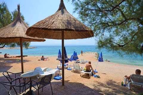 On the beach, sun loungers