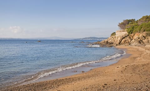 Beach nearby, sun loungers