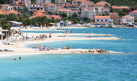 On the beach, sun loungers, beach towels