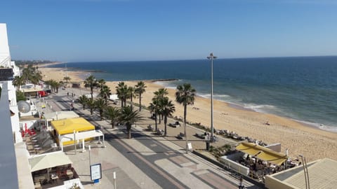 On the beach, sun loungers