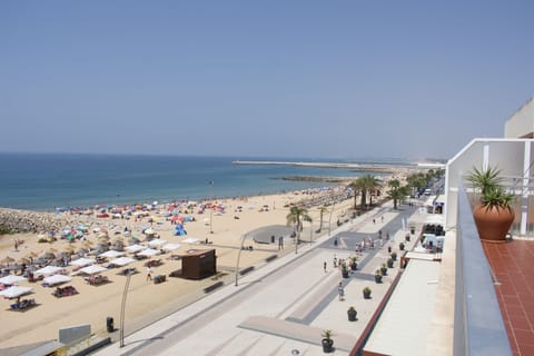 On the beach, sun loungers