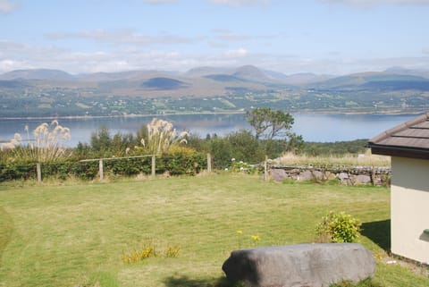 View side of house/back yard (soccer field)