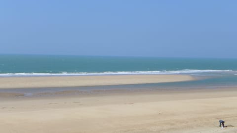 On the beach, sun loungers