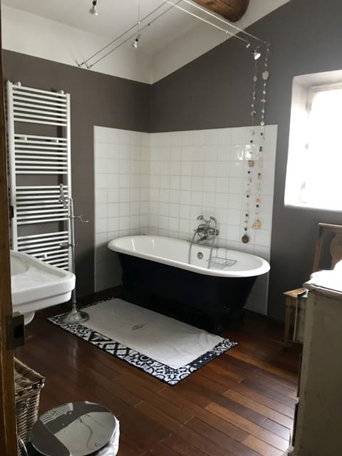 Combined shower/tub, hair dryer, towels, soap