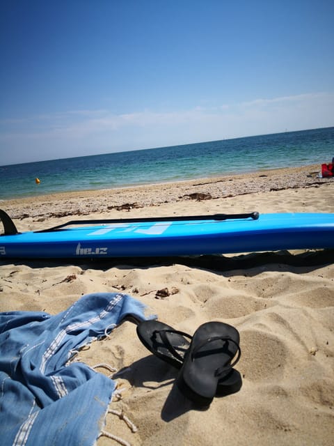 On the beach, sun loungers