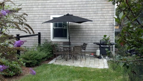 Private patio has BBQ and seating for four.
