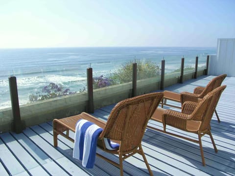 Oceanfront relaxing chaise lounges