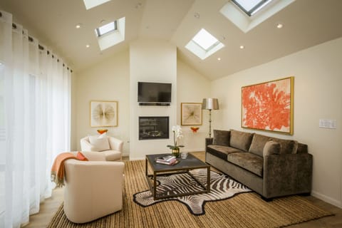 Living room with operable skylights