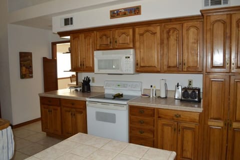 Kitchen showing door way into dining room