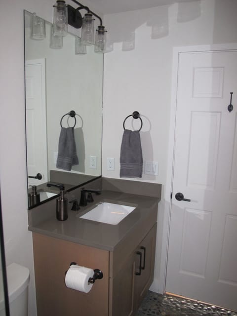 Combined shower/tub, hair dryer, towels, soap