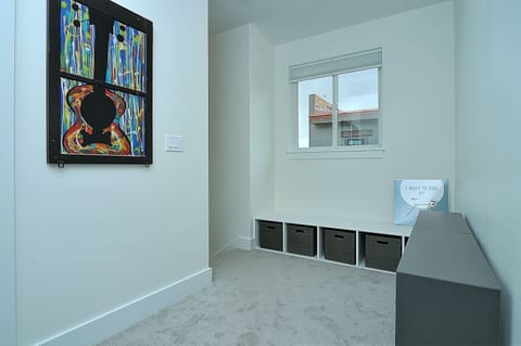 Landing area with books, toys, games, etc.