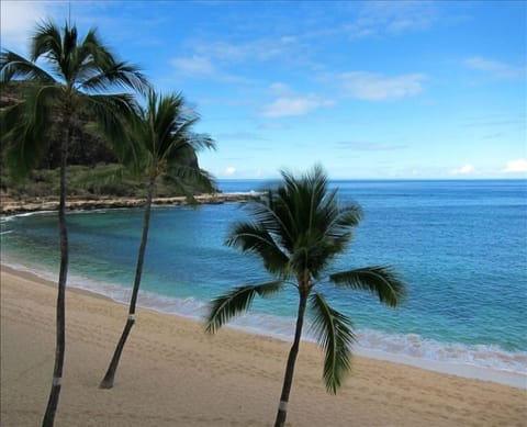 On the beach, sun loungers, beach towels