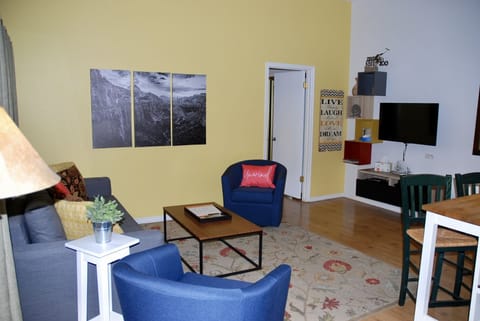 Our living room is comfortable with plenty of seating.