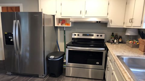 Microwave, dishwasher, coffee/tea maker, cookware/dishes/utensils