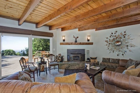 Living room with a view to the beauty of Palomar Mountain and trees, trees trees