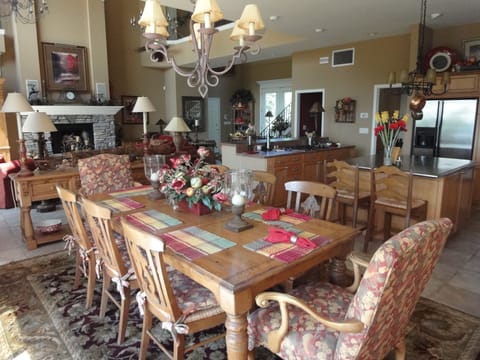 Rustic pine dining table with seating for 8