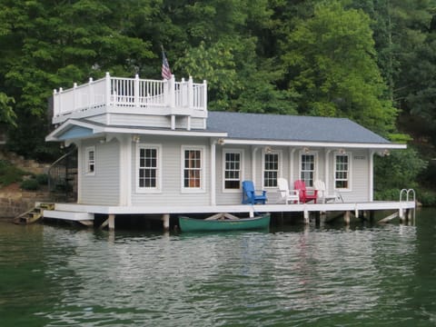 Modern Boathouse (the cottage is tucked behind the trees above the boathouse).