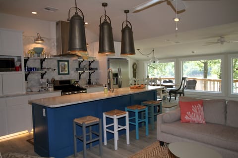 Gorgeous kitchen open to lake views!