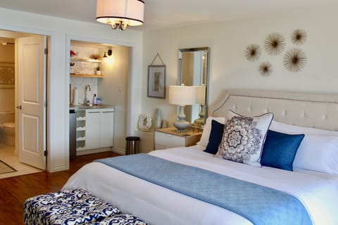 The Roost suite with kitchenette and luxurious King bed.
