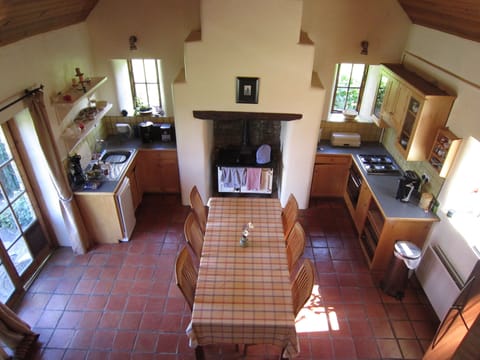 The kitchen from the top of he staircase to left bedroom