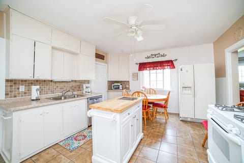 Kitchen with island on wheels