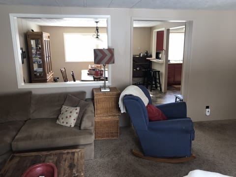 View from living room to dining and kitchen area