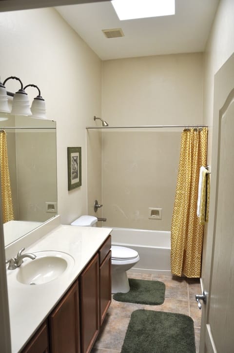 Combined shower/tub, hair dryer, towels, soap