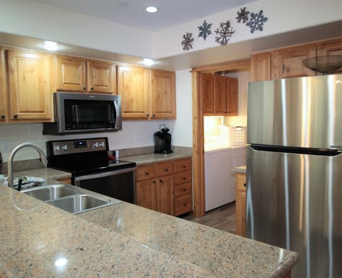 Kitchen with all new stainless steel appliances