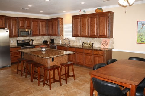 Kitchen / Dining area. SS appliances and granite counters.