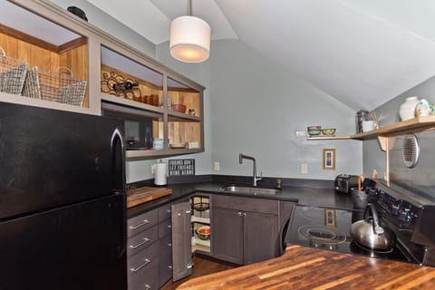 Kitchen with eat-in island in foreground