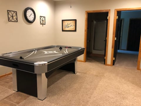 Take a Break from the Water and Play Air Hockey in the Lower Level Family Room
