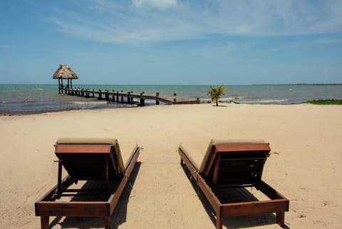 On the beach, sun loungers, beach towels