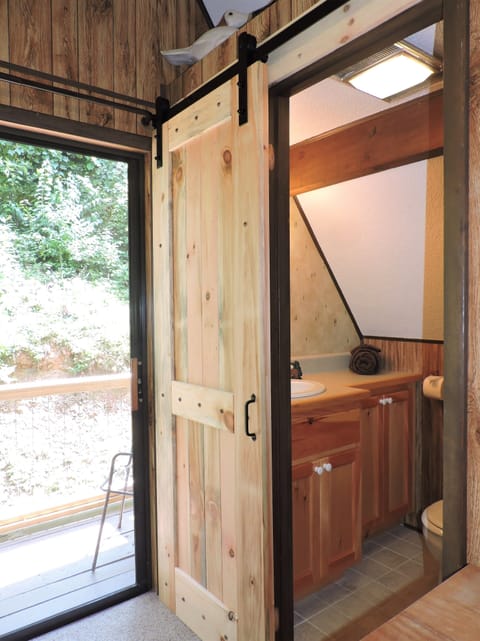 Second floor bathroom with single shower to the right.