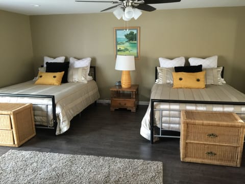 Large Master Bedroom w/2 Queen Beds and Access to Pool.