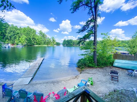 Lake front view. Property includes chairs, fire pit, and 30 foot dock. 