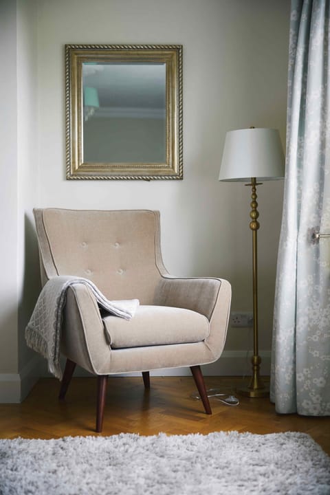 Master bedroom with super king bed and view out onto our horse paddock.