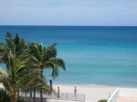 On the beach, sun loungers, beach towels