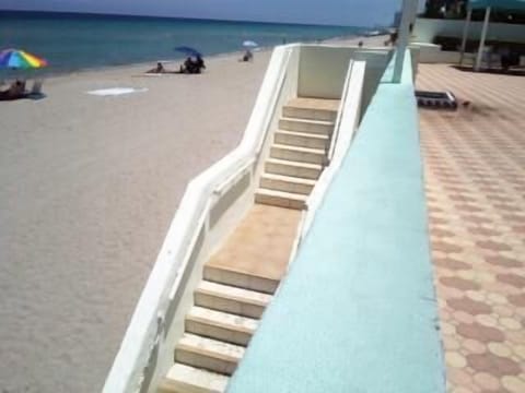 On the beach, sun loungers, beach towels