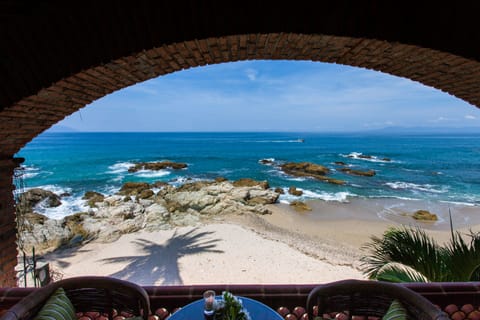 On the beach, sun loungers, beach towels