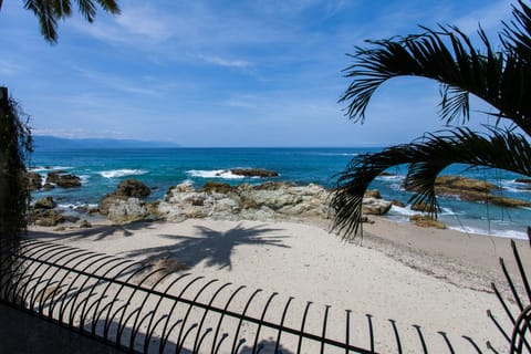 On the beach, sun loungers, beach towels