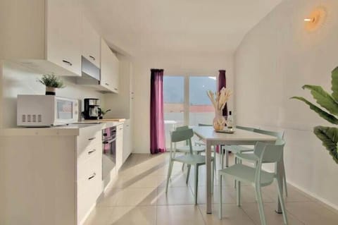 Kitchen with doors to terrace