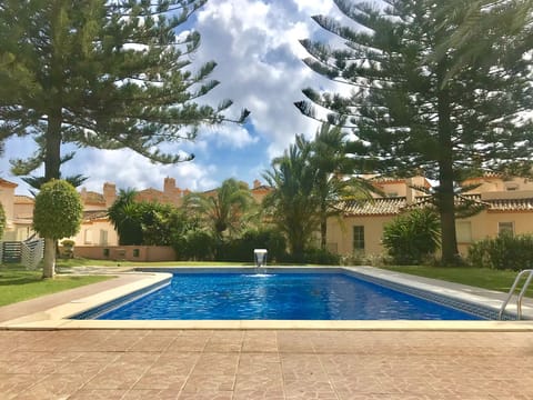 The gated pool with direct beach access.