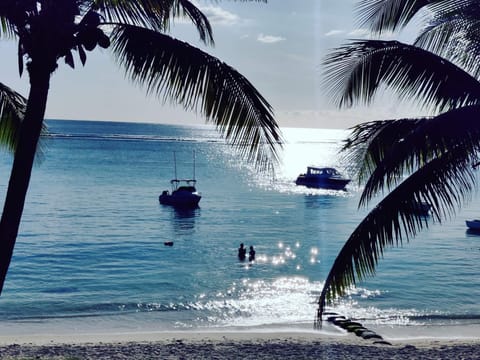 On the beach, sun loungers, beach towels