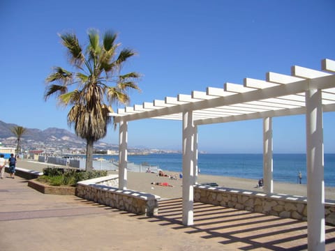 On the beach, sun loungers, beach towels