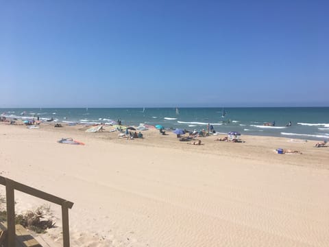 On the beach, sun loungers