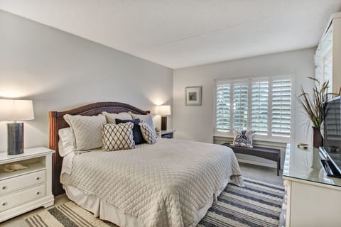 Master Bedroom with a King Bed, Plantation Shutters, Flat Screen TV, and Breathtaking Ocean Views
