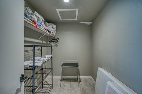large walkin closet for downstairs MRB - has desk can be ofc or extra sleep area