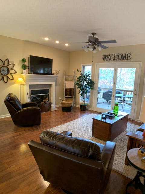 Large living room with 4k TV soundbar Roku, High-speed internet